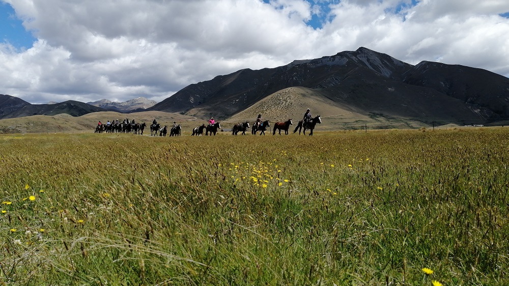 Kat Riding off the mountains